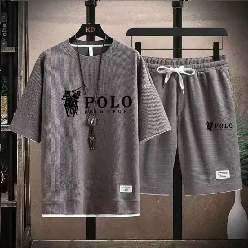 2025 Men's Short-sleeved T-shirt + Sports Shorts Two-piece Summer Fashion Breathable Fitness Casual Jogging Set.