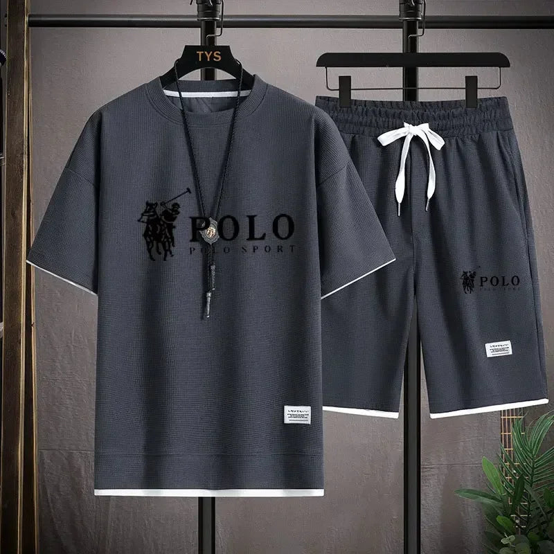 2025 Men's Short-sleeved T-shirt + Sports Shorts Two-piece Summer Fashion Breathable Fitness Casual Jogging Set.